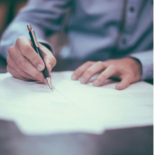 Fit out contractor reviewing a commercial project agreement